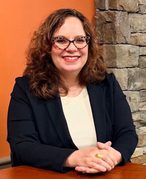 Alexia Georghiou, founder of the Knoxville Happiness Coalition, advancing happiness, workplace wellbeing, human-centered leadership, and community connection.